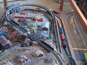 Overview of a coffee table N Scale model train layout.